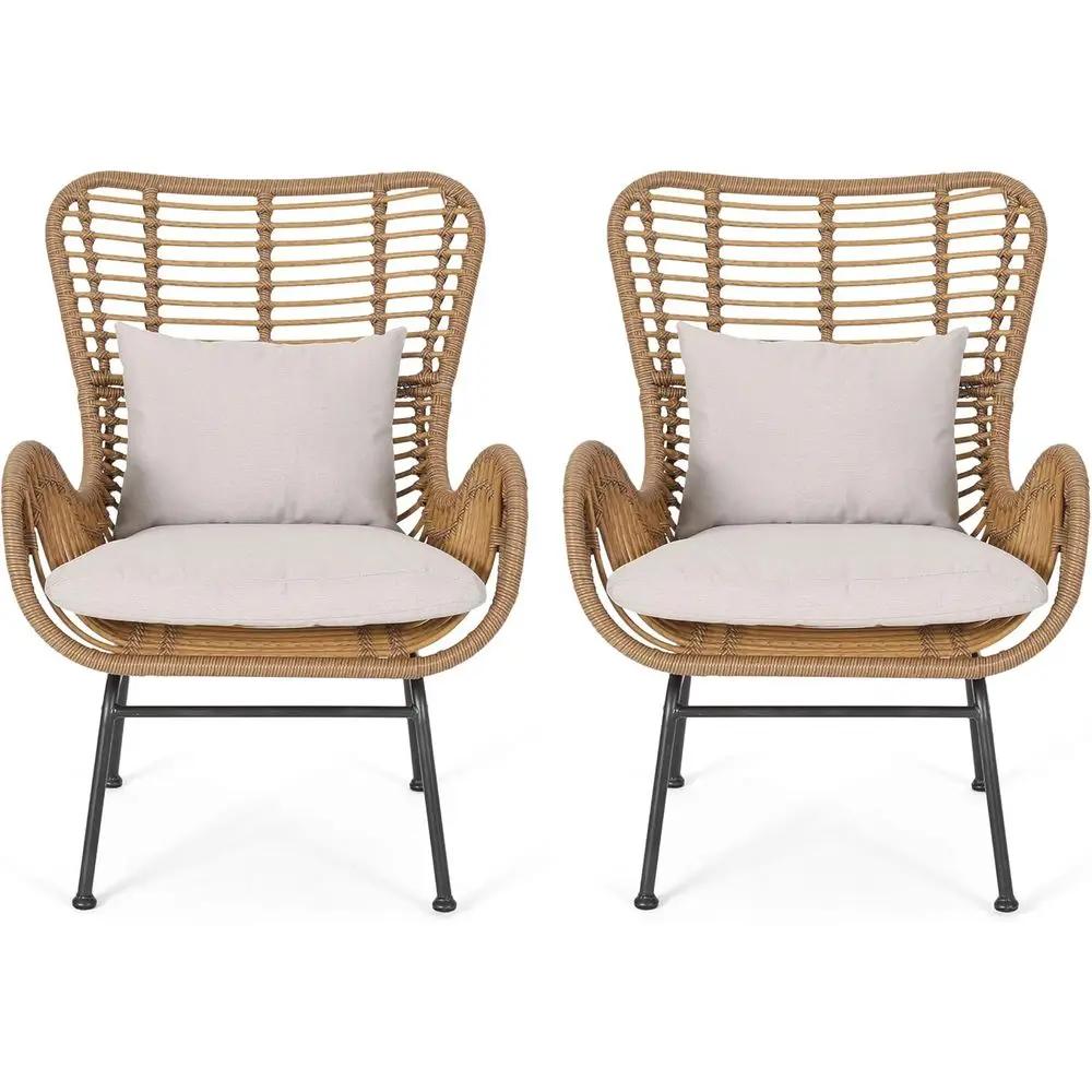 Pair of outdoor armchairs in light brown and beige wicker with cushions