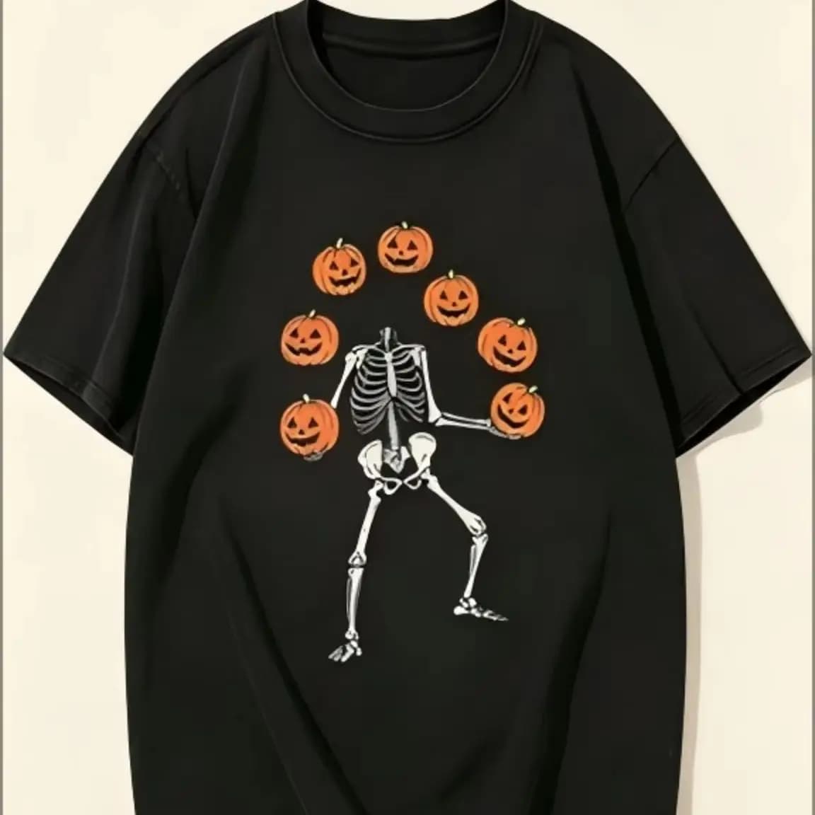 Halloween Skeleton Juggling Pumpkin Graphic T‑Shirt, Fun Fall Holiday Art Print Tee, Casual Short Sleeve Top for Party Daily