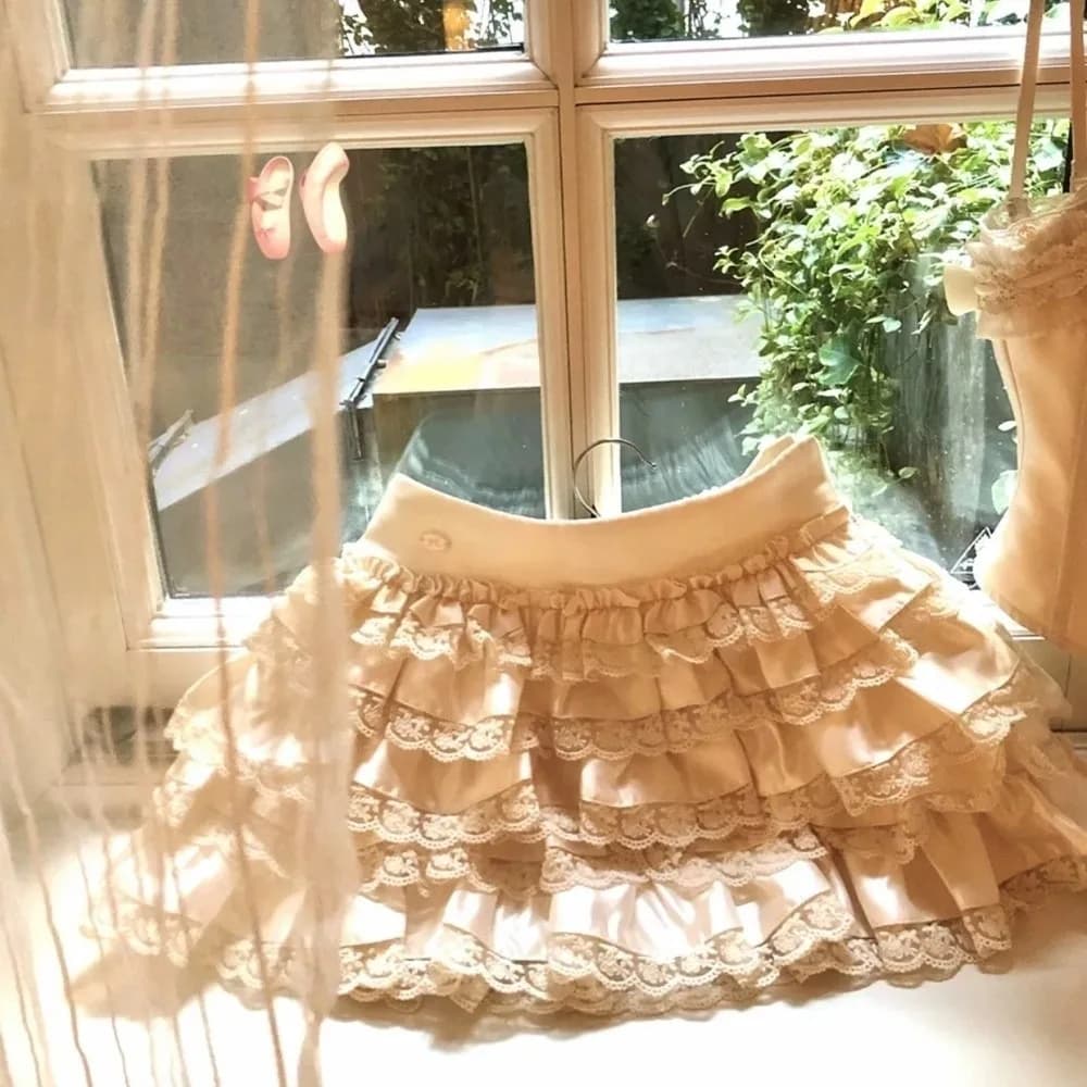 Elegante fiocco in pizzo con fionda senza maniche canotta con volant gonna corta chic sottile fiore soffice gonna torta ragazze piccanti