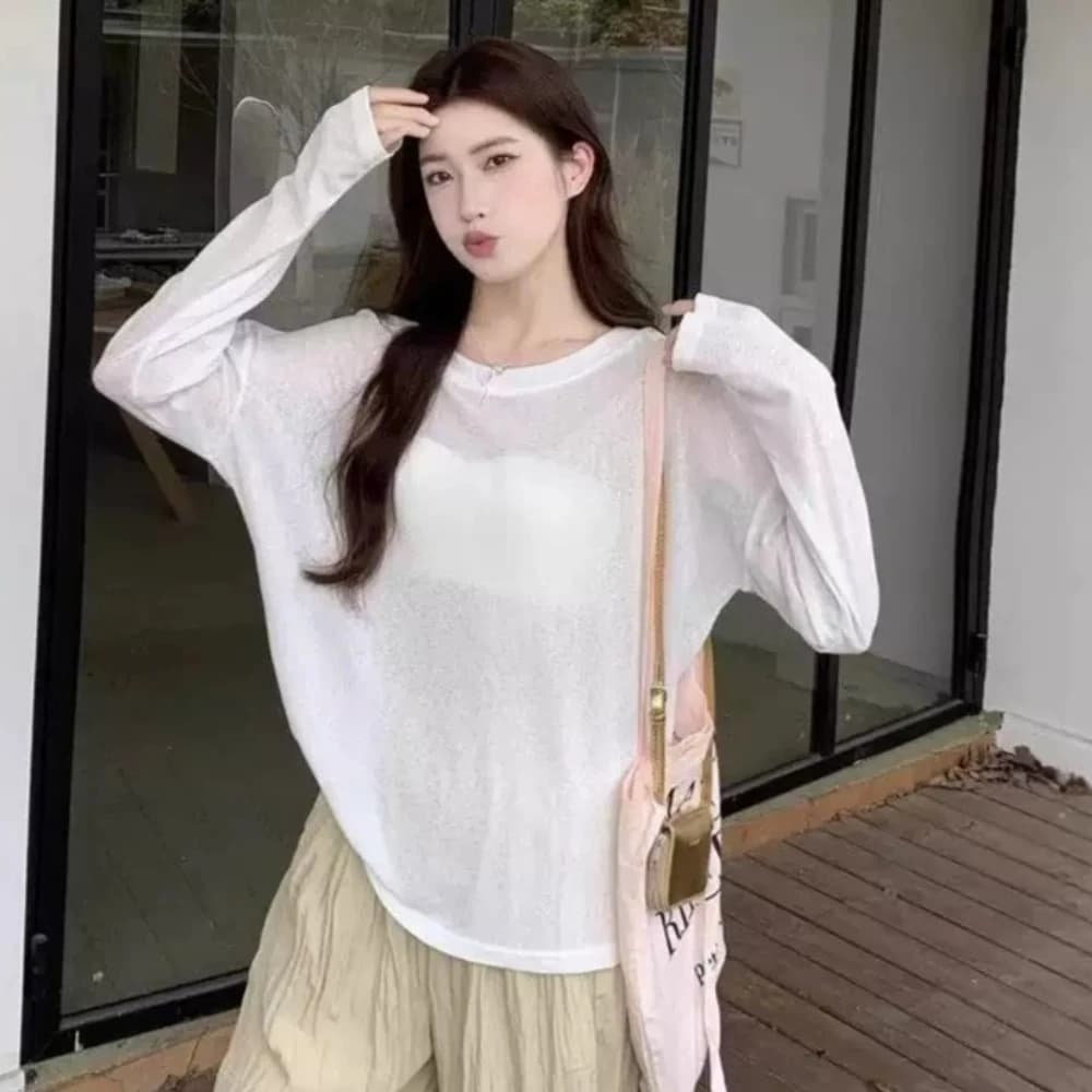 T-shirt a strati base dimagranti da donna Stock europeo Micro traslucido Pure Desire Felpa casual T-shirt a maniche lunghe