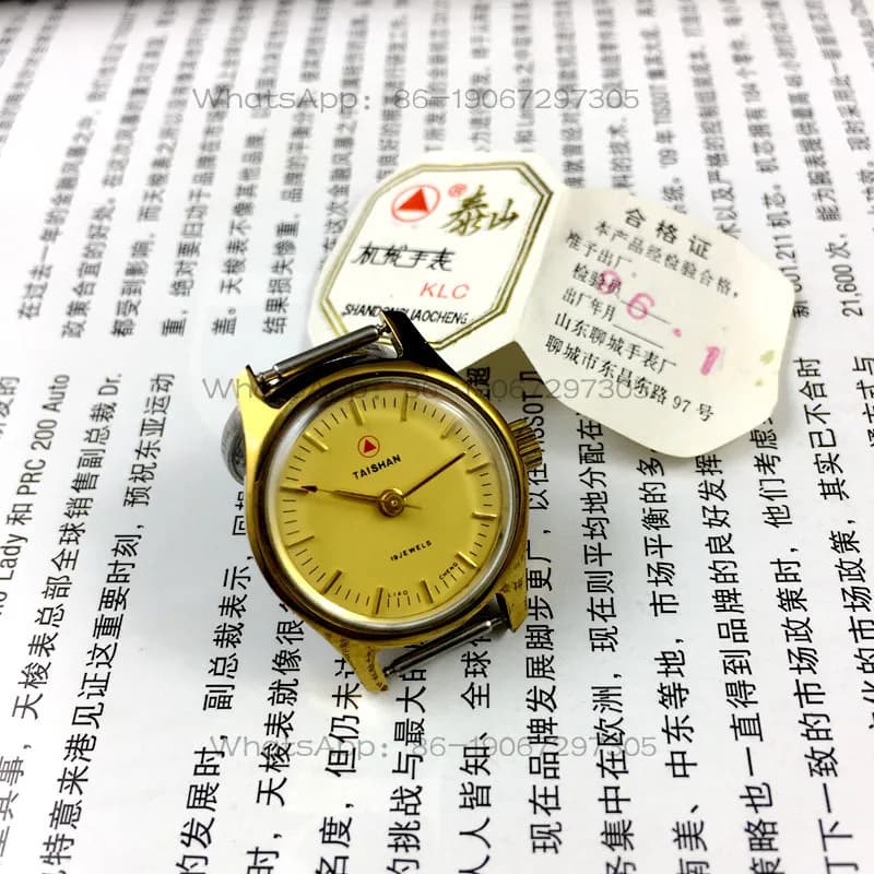 Inventario originale prodotto dalla Fabbrica di Orologi Shandong Liaocheng, orologio meccanico manuale da donna marca Taishan, cinturino in omaggio.