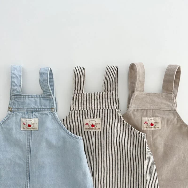 2025 Primavera Estate Bambini Ragazzo Jeans Cotone Tasca rattoppata Bambino Ragazzo Bretelle Bottone solido Sling Infantile Neonato Denim Pant