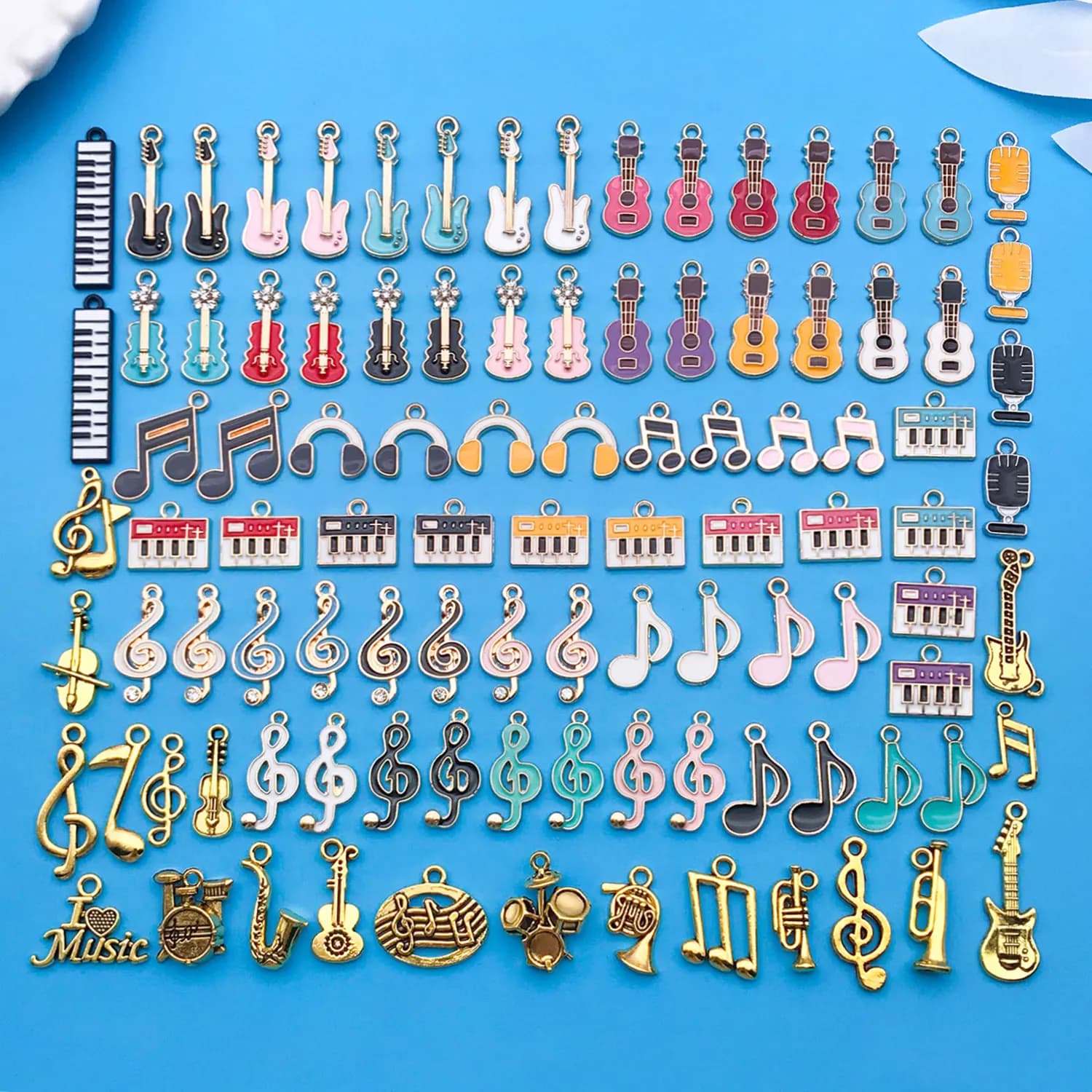 Mix 100 pcs of alloy enamel music series charms pendants, suitable for DIY necklace, earring,keychain jewelry making accessory.