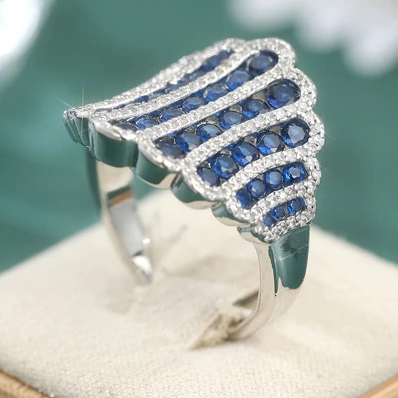 Anelli in argento placcato Fashion Eternity da donna con zirconi cubici sintetici blu, accessori eleganti per feste e uso quotidiano, gioielli di lusso