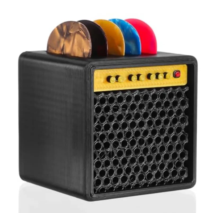 Guitar Picks Holder Box for stage and studio use, durable ABS plastic, black finish, compact amp speaker design with secure pad