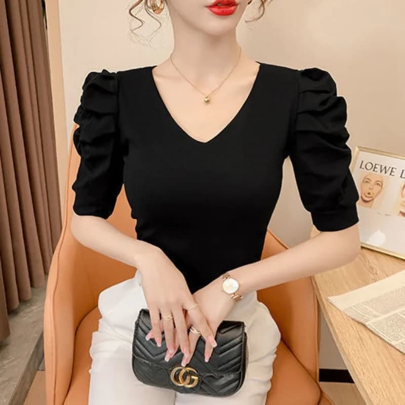 T-shirt da donna manica a sbuffo elegante estate chic confortevole semplice per il tempo libero moda vendita calda scollo a V design magliette tutto-fiammifero Harajuku