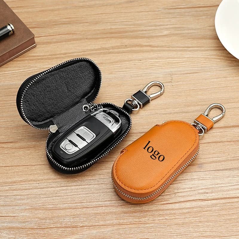Portachiavi con logo personalizzato laser Borsa portaoggetti per chiavi per telecomando per auto in pelle Portachiavi multifunzionale universale di grande capacità