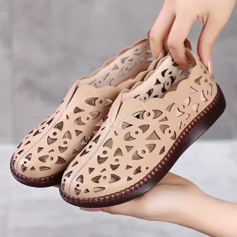 Sandali piatti alla moda da donna Primavera Nuova testa tonda Scarpe basse basse resistenti all'usura con suola morbida cava profonda