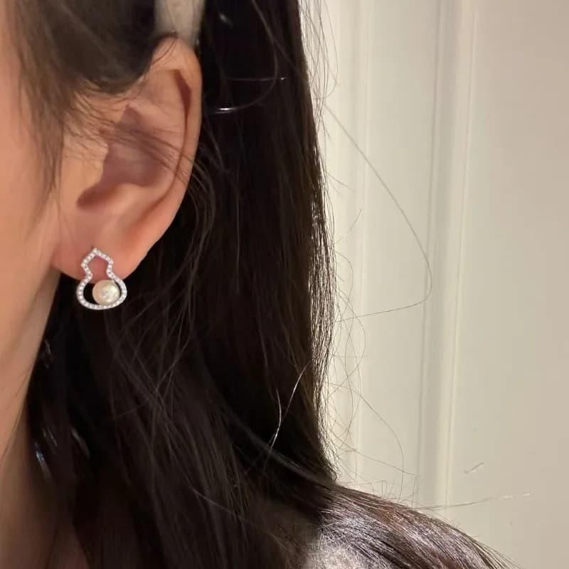 Orecchini di perle di zucca di diamanti intarsiati in argento 925 di lusso leggero e di fascia alta per le donne, orecchini scavati alla moda