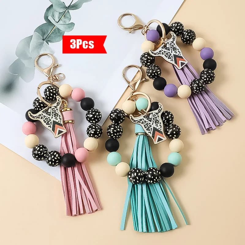 Set di 3 pezzi: Braccialetto rosa con stampa leopardata, nappa e portachiavi in morbido silicone con perline, accessori audaci in stile western per lo street style