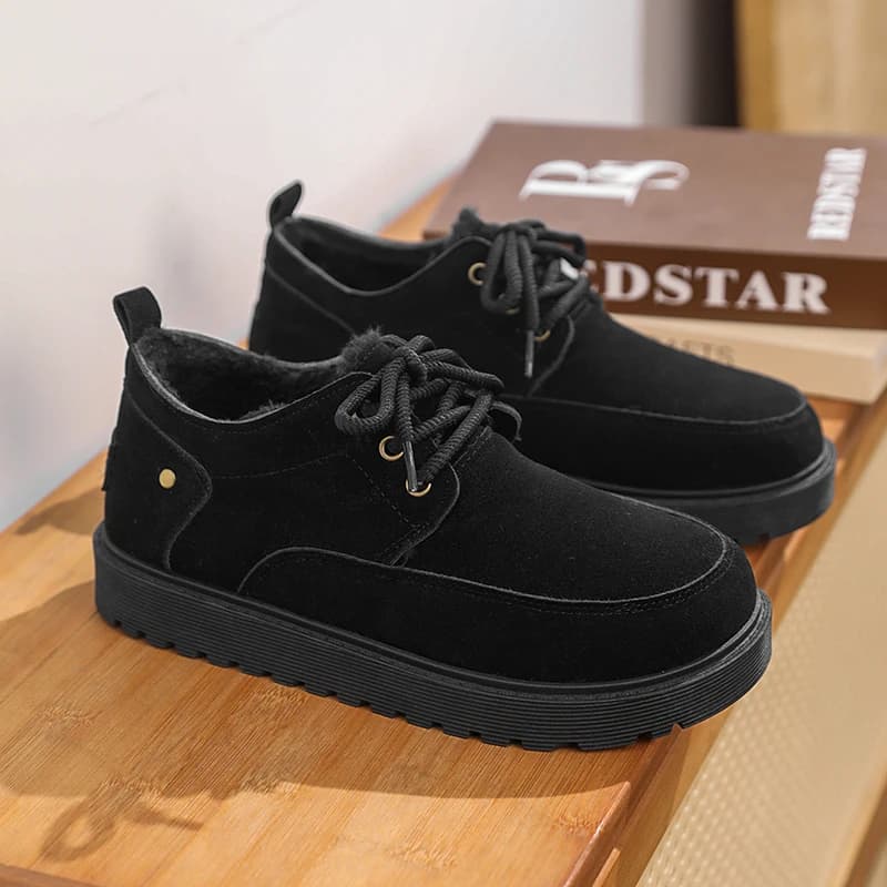New winter snow boots lined by man, comfortable non-slip moccasins for outdoor leisure