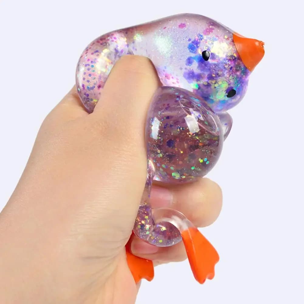 Anatra Squishy Glitterata per Bambini, Giocattolo Antistress Animale, Pallina Antistress Sensoriale, Gadget per Feste, Riempitivo per Cesti di Pasqua