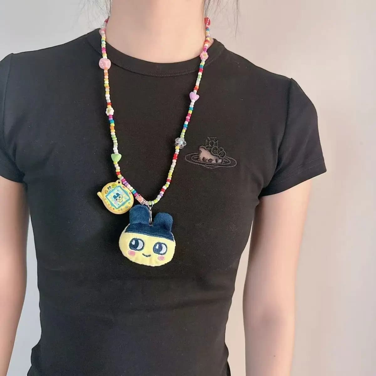 Tomoko Kamei's plush necklace in a Harajuku style, featuring a soft girl outfit accessory in a millennium girl style.