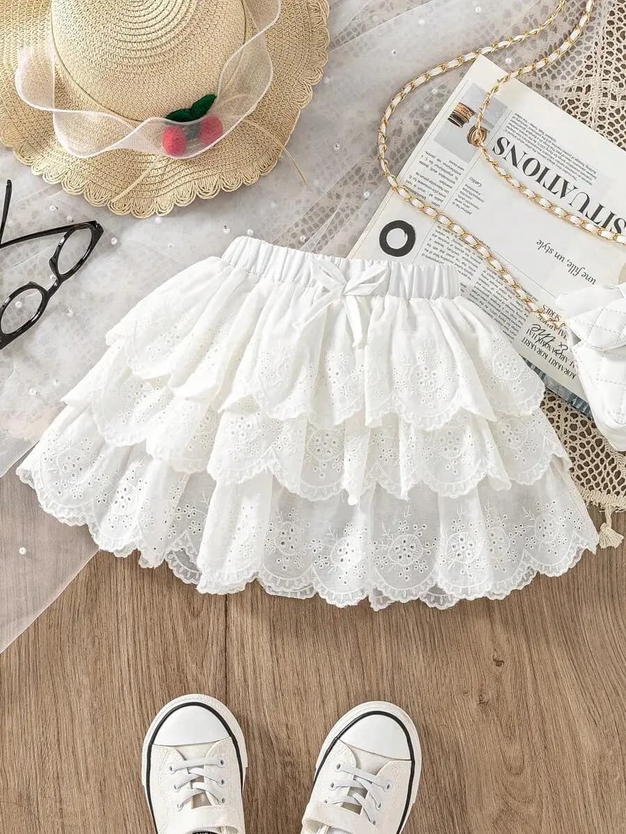 Gonna a balze in pizzo bianco per bambine, design dolce con volant e vita elasticizzata
