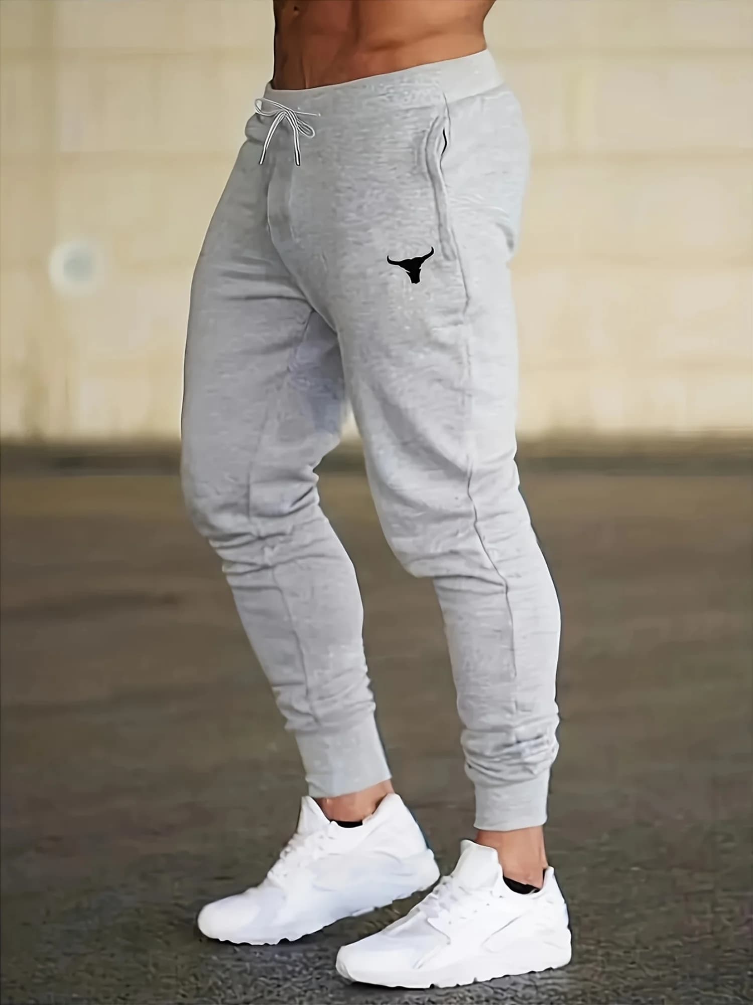 Pantaloni sportivi casual da uomo, leggeri ed elasticizzati, con stampa del logo a forma di testa di toro, pantaloni larghi da uomo.