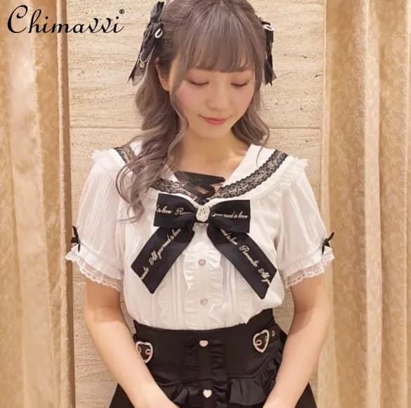 Magliette di body camicia di Lolita di pizzo dolce carino classico da miniera giapponese da donna a maniche corte con ricamo di perle Slim-fit Y2k camicetta top