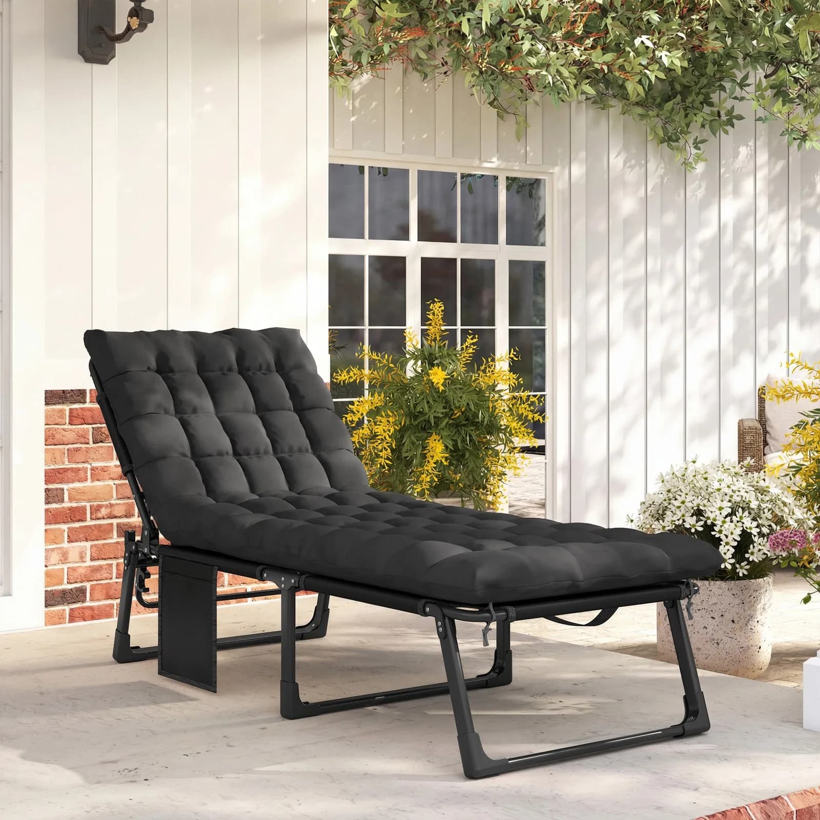 Chaise longue pieghevole da esterno con cuscino, nera