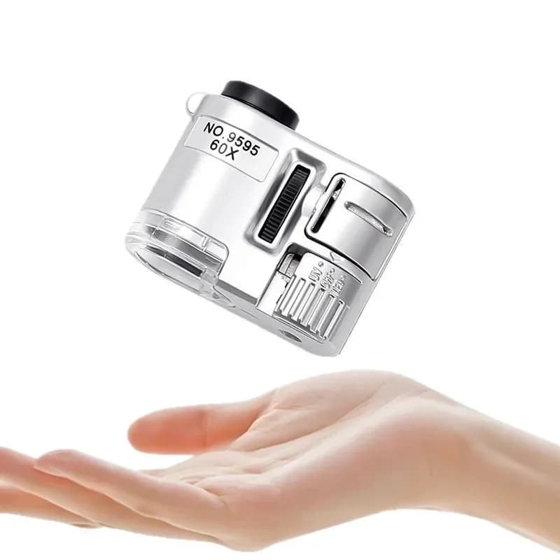 Mini lente d'ingrandimento tascabile 60X con lente d'ingrandimento UV portatile a luce LED Microscopio portatile per gioielliere