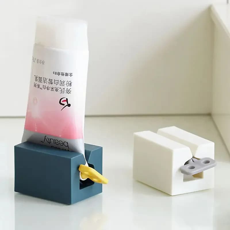 1PC Dispenser di dentifricio Spremiagrumi Accessori per il bagno Porta dentifricio Organizzatore Tinture per capelli Cosmetico Creativo Spremiagrumi Nessun rifiuti