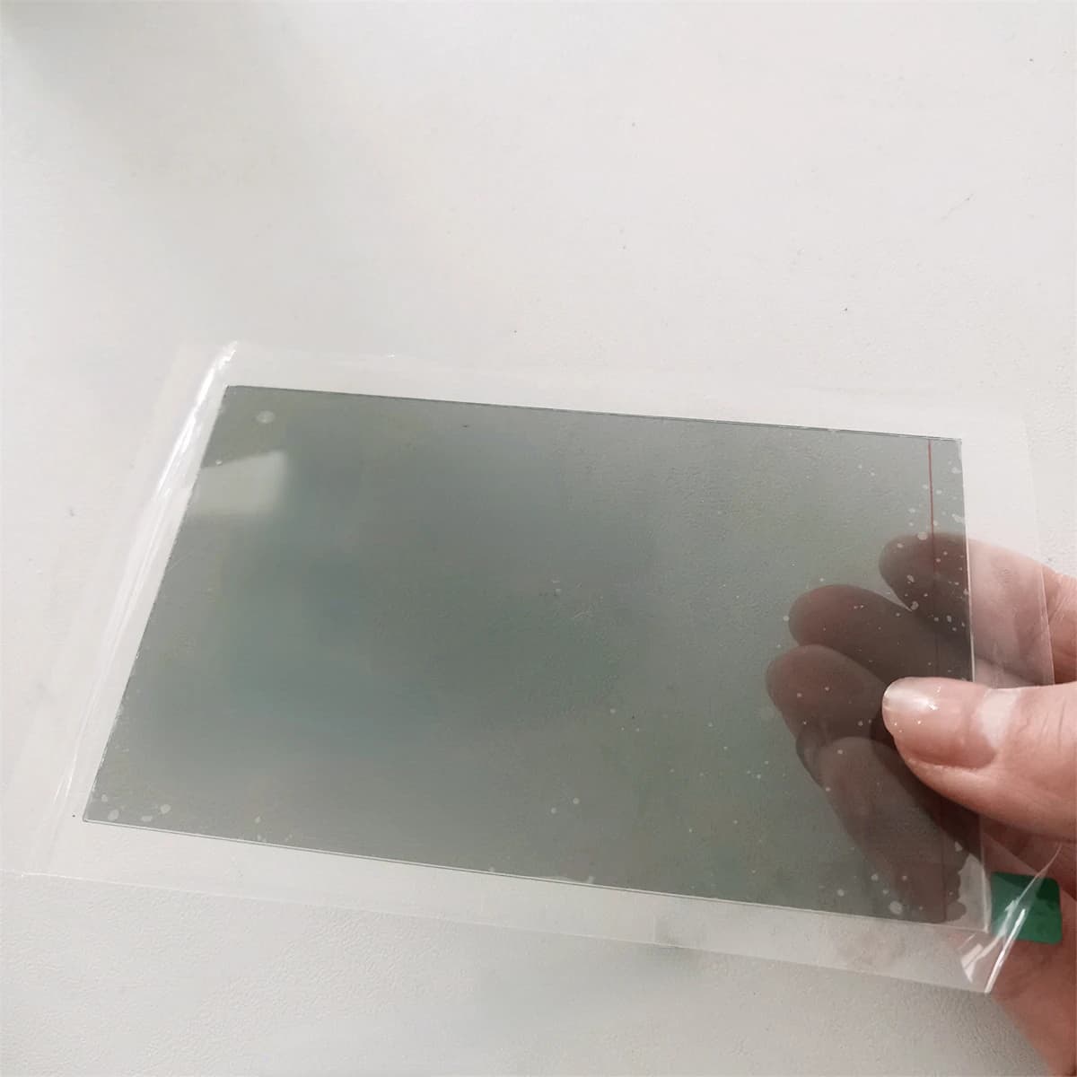 104*63.5mm Vetro polarizzatore a isolamento termico Micro LED Proiettore Isolamento termico per la riparazione gialla dello schermo di caduta della temperatura