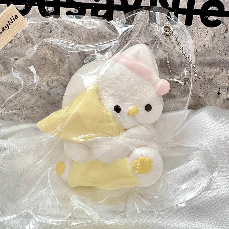 Adorable slow-rebound squeeze toys featuring little animals hugging pillows—perfect as a gift for friends or a treat for yoursel