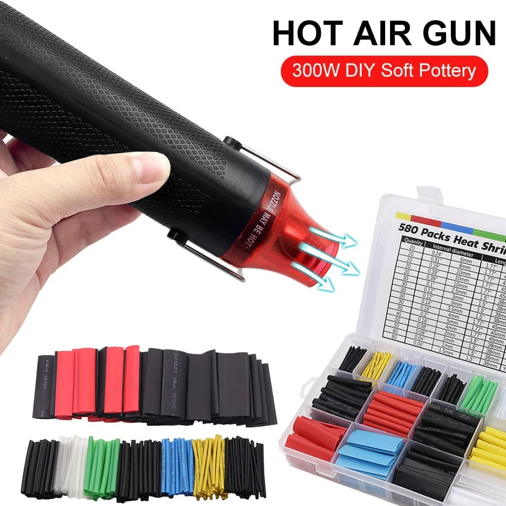 Pistola ad aria calda portatile mini pistola termica elettrica da 300 W con 580 pezzi di testa termorestringente per goffratura artigianale fai da te in PVC
