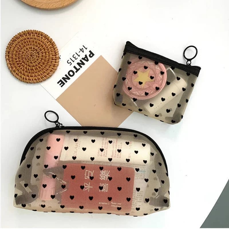 Custodia per astuccio per trucco cosmetico in Mesh di moda conveniente per trasportare astuccio per penna a matita stampato con cerniera trasparente a cuore nero