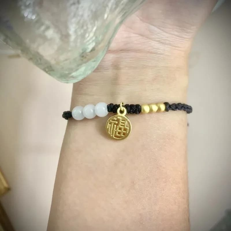 New bracelet with yellow gold transfer beads by Hollow Fu brand, thin hand rope woven by woman, small pendant for Christmas year, bracelet with Fu character