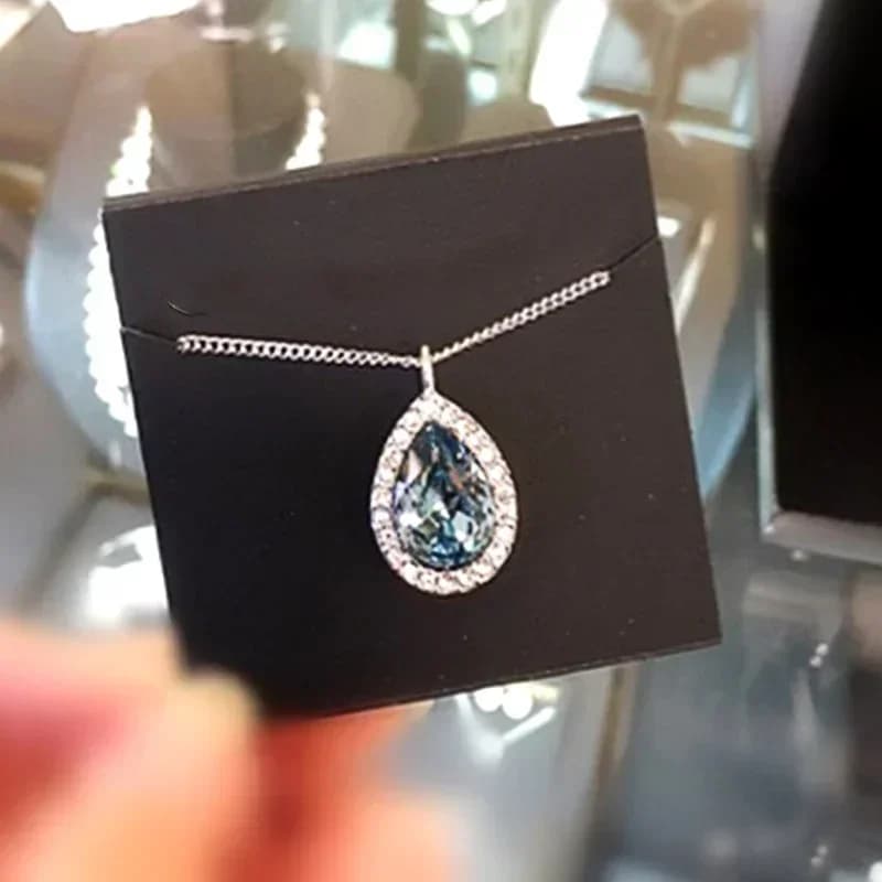 New charming necklace with drop-shaped pendant Jewelry with brilliant blue zircons for anniversary party Fashionable woman wedding