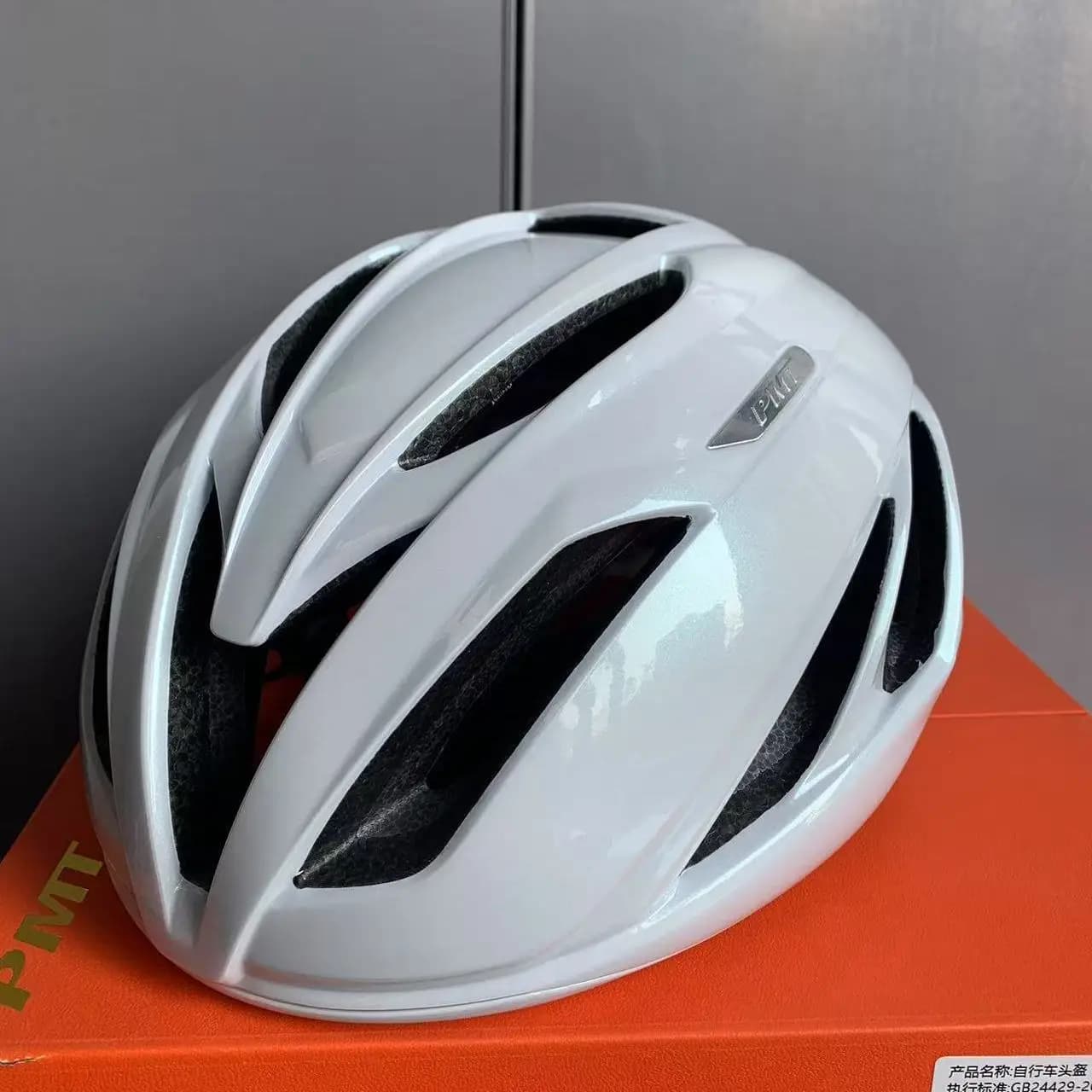 Casco da bicicletta COFFEE5.0 da uomo e da donna, integrato per bici da strada e mountain bike, con rivestimento in fibra argentata