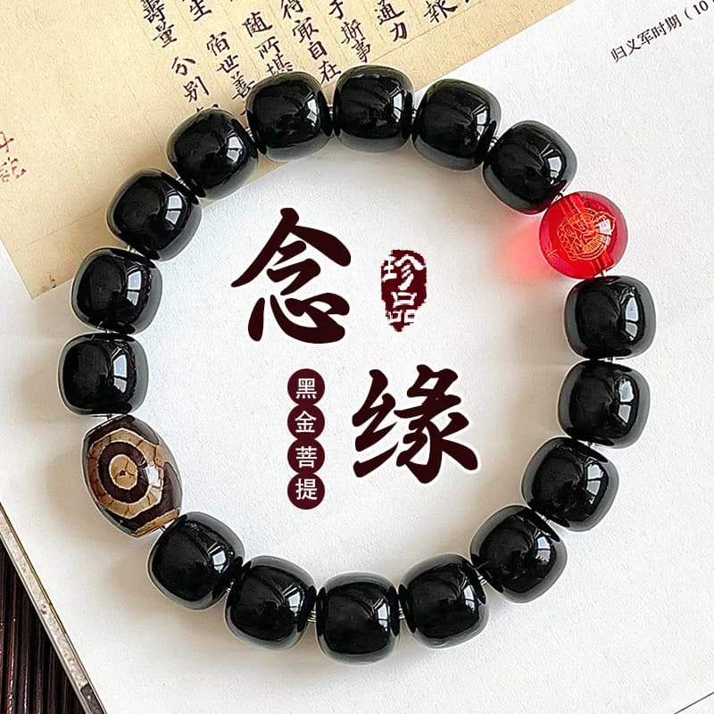 Bracciale con perline buddiste in oro nero naturale Bodhi a cerchio singolo stile zodiaco avvolgente intorno al dito. Consegna diretta