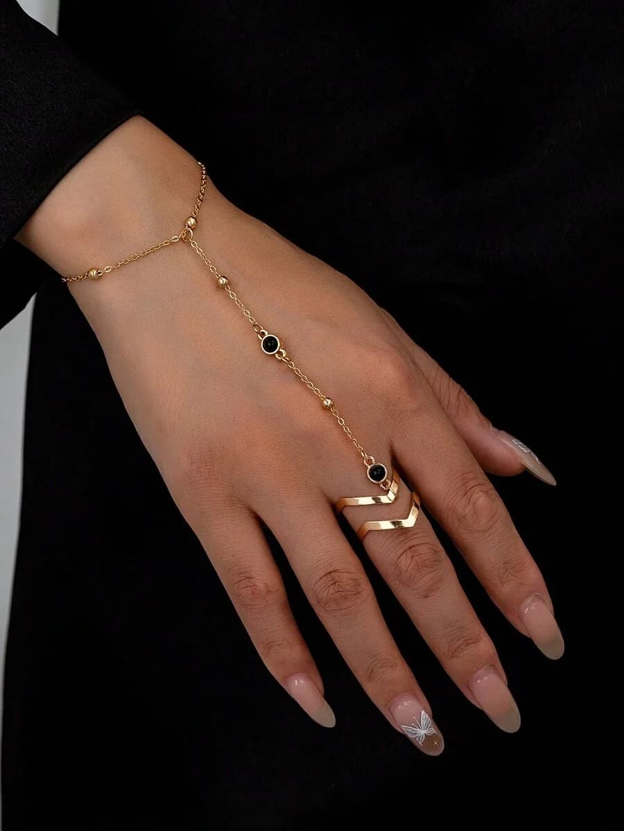 1 anello da pollice con catena di perline, stile minimalista, misura regolabile, accessorio quotidiano per donna.