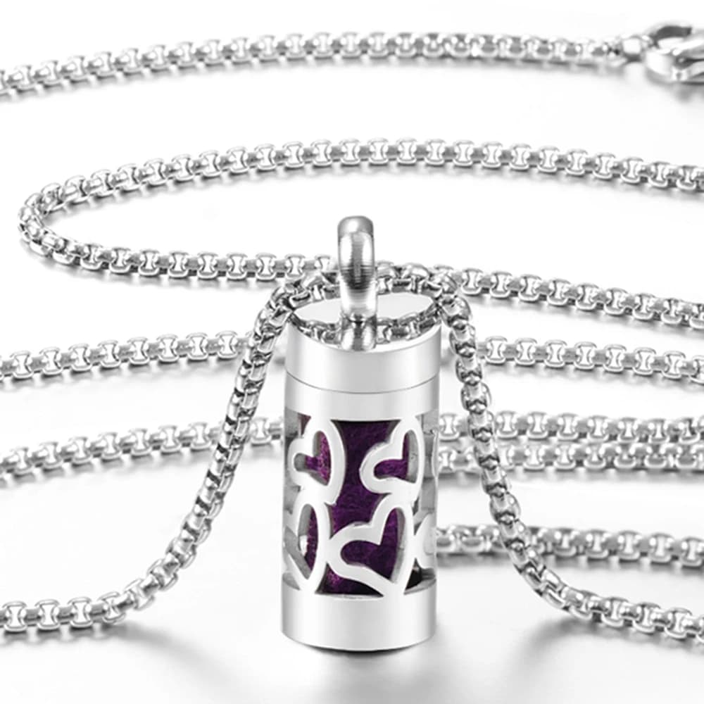 Nuovo modello a forma di cuore Aromaterapia Ciondolo scavato Collana con medaglioni diffusore di oli essenziali per profumo da donna in acciaio inossidabile