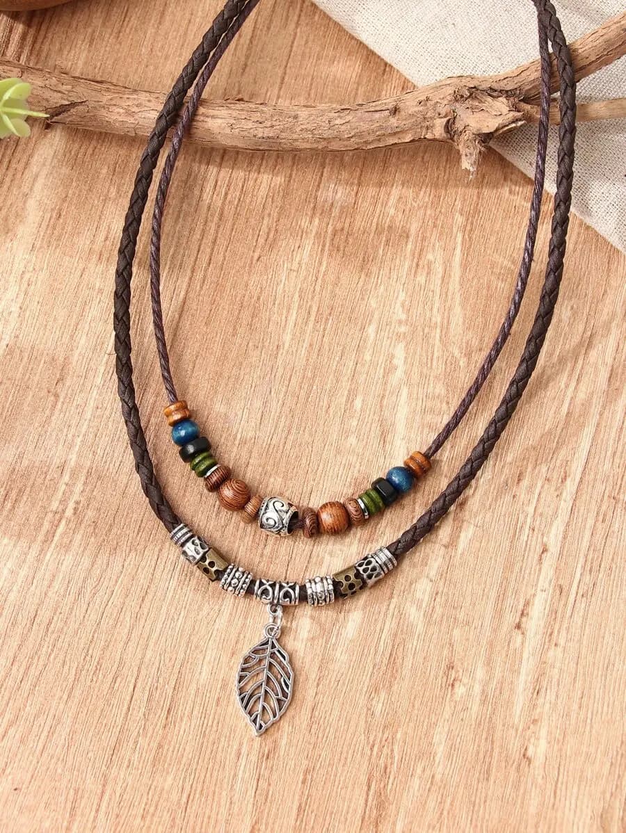 Collana a strati con perline e ciondolo a forma di foglia