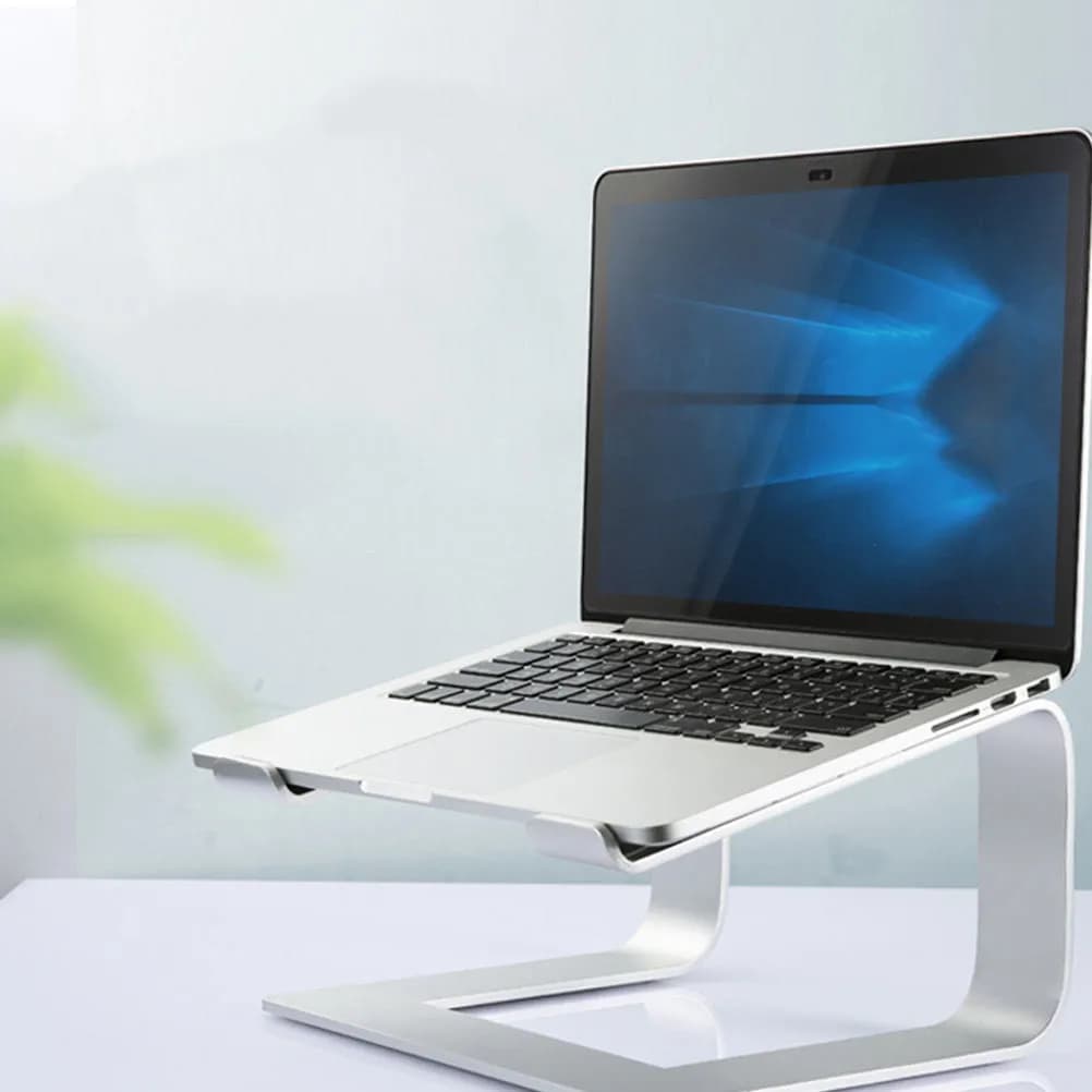 Supporto per laptop in lega di alluminio da 1 pezzo, supporto da tavolo robusto e resistente con cuscinetti in silicone antiscivolo per alleviare la postura ergonomicamente e favorire il relax.