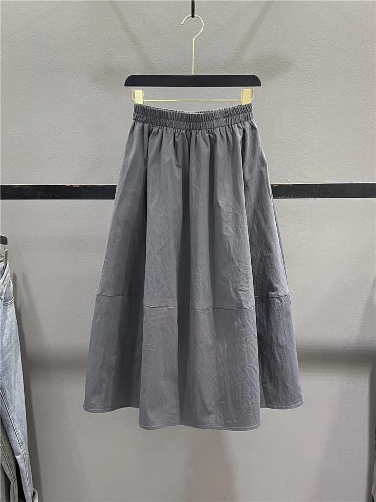 Half-length elastic waist skirt with bud pattern, feminine style, for pear body shape, which hides imperfections and streamliness, parasol pattern.