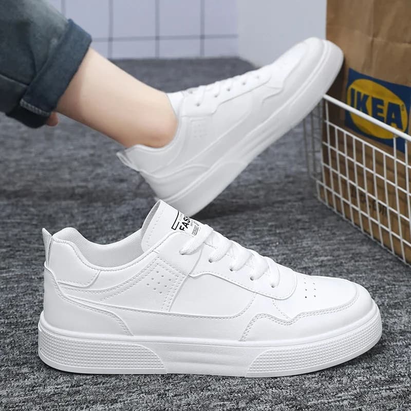 Scarpe Casual da esterno bianche scarpe da ginnastica da skateboard da uomo in pelle scarpe da corsa leggere piattaforma scarpe sportive da Tennis traspiranti