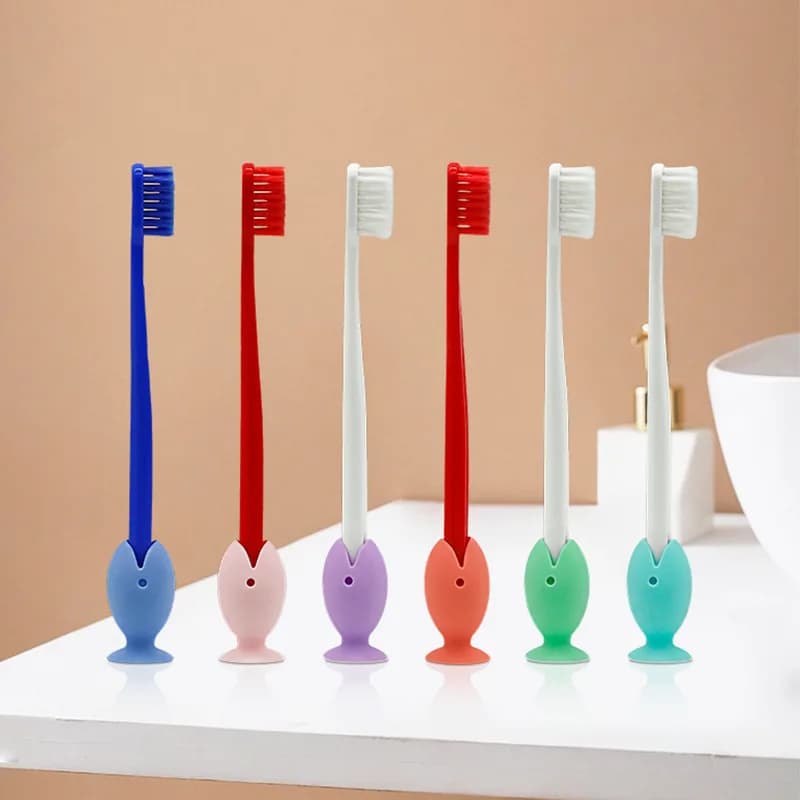 12/6 pieces in random colors, creative fish-shaped silicone toothbrush holder with suction cup base, firmly adheres to the countertop, can store toothbrush heads, compact and space-saving, bathroom sink organizer, perf