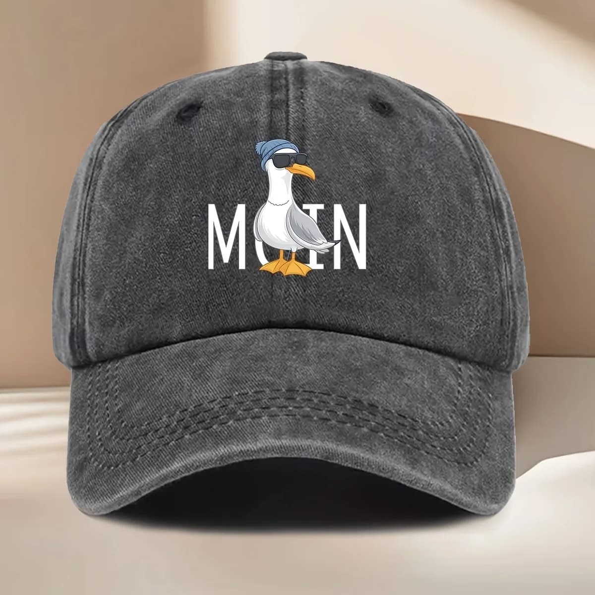 Baseball Hat with print of a cartoon of a seagull with blue hat and fashionable glasses, suitable for any season