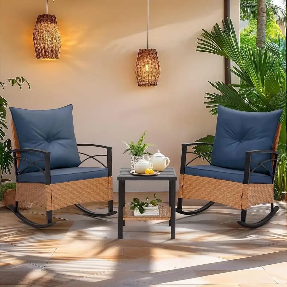 Set of blue garden furniture in 3 pieces with rocking chair, pillows and coffee table at 2 levels