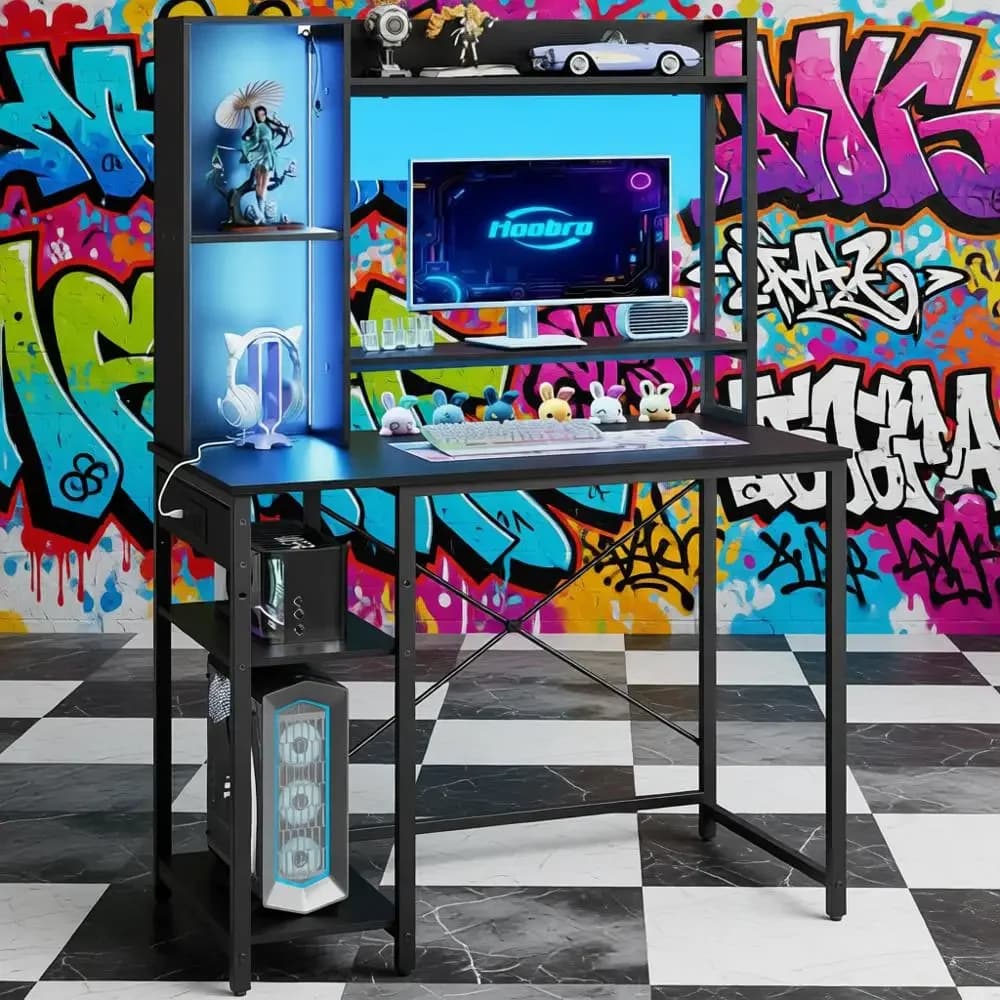 LED illuminated gaming desk with sockets and adjustable monitor support for small spaces
