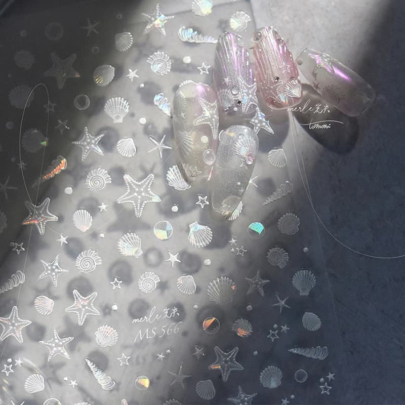 Guscio lucido Luce Laser Conchiglia di mare Conchiglia Stella marina Stella Adesivo Adesivi per nail art Decalcomanie Fantastiche ciondoli per la vita marina