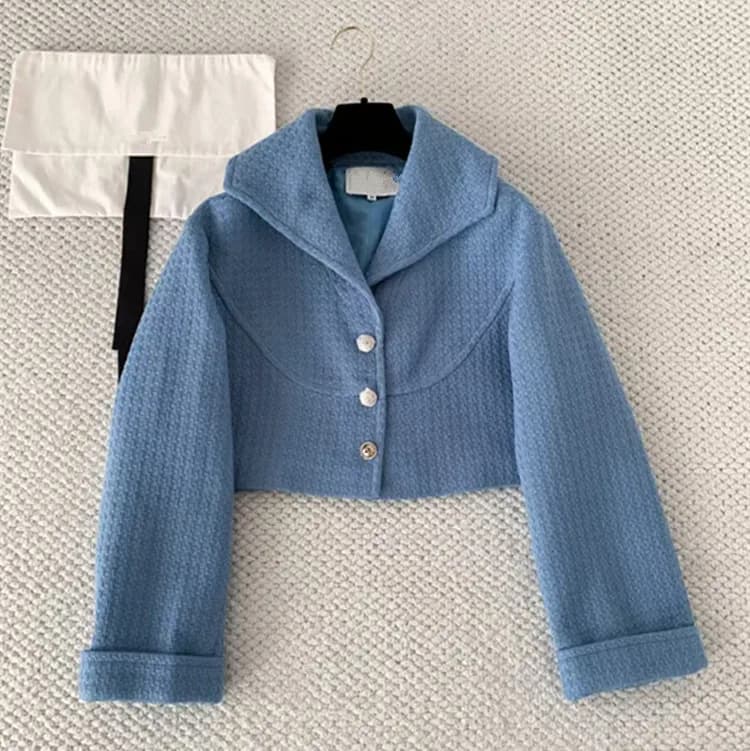 Abbigliamento donna personalizzato in stile europeo 2026 Nuovo stile invernale Cappotto in tweed con risvolto blu a maniche lunghe Giacca e gonna