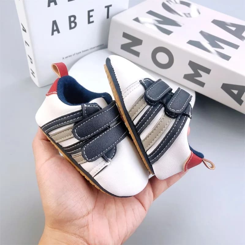 Scarpe da prima camminata per bambini da bambino Stile sportivo Doppio cinturino in velcro Suola in gomma antiscivolo Scarpe da ginnastica versatili per neonati
