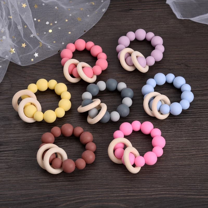 1 pz bambino perline in Silicone bracciali massaggiagengive sonagli in legno doppio anello ciondolo giocattolo naturale per bambino allattamento dentizione anello a mano
