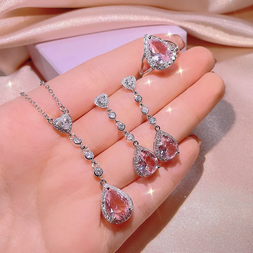 Set di gioielli romantici Set di anelli per collana con orecchini a goccia rosa chiaro per accessori per feste di gioielli di moda color argento da donna