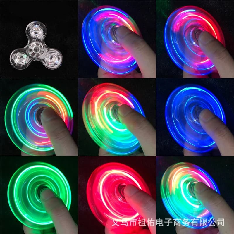 NUOVO cristallo luminoso LED luce Fidget Spinner mano Top Spinners Glow in Dark giocattoli antistress giroscopio cinetico per bambini