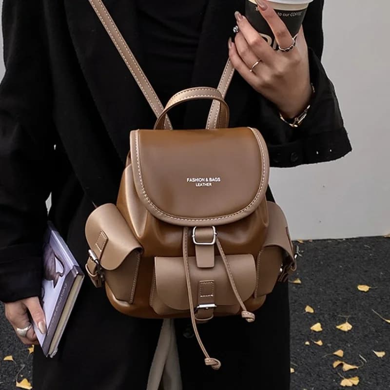 Zaino vintage in pelle nera e marrone, design con chiusura a coulisse e tasche laterali, per la scuola e l'uso quotidiano, borse da donna