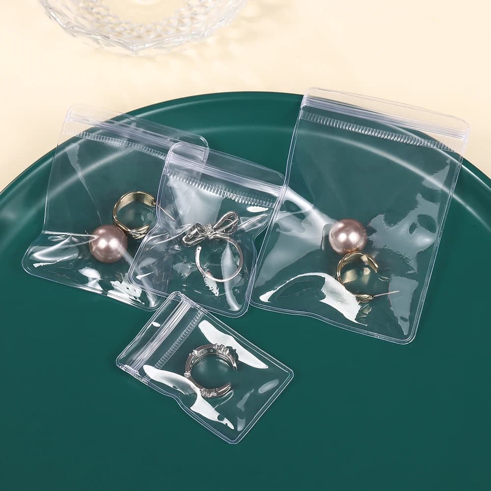 20-50 pezzi sacchetti per gioielli trasparenti in PVC sacchetto di immagazzinaggio con cerniera per orecchini collana gioielli sacchetti per imballaggio display anti-ossidazione