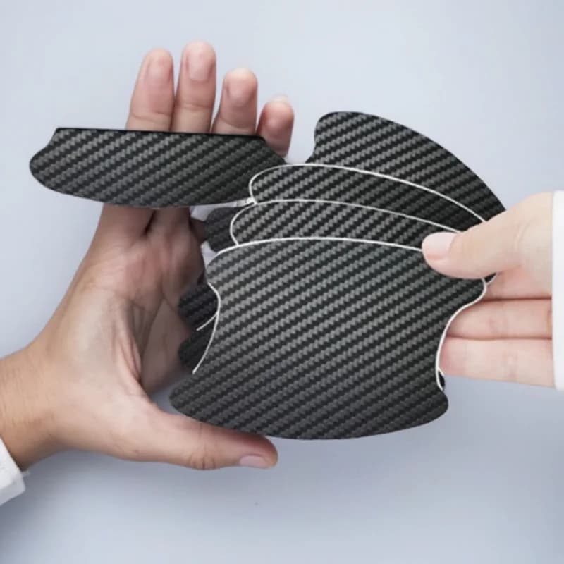 Adesivo universale per maniglia per portiera auto in fibra di carbonio Pellicola protettiva in vinile antigraffio Accessorio esterno per auto